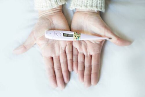 Basal body temperature, measured with a specific thermometer, is used to track menstrual cycles.
