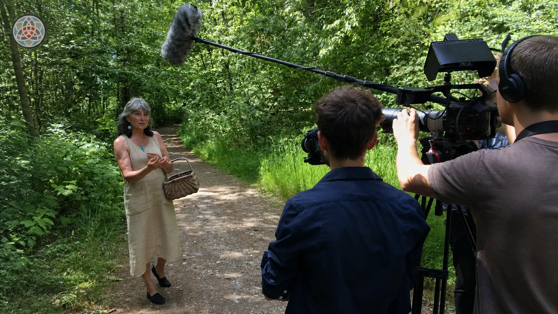 Medical Herbalist Amanda Howe wildharesting herbal medicine on a herb walk in the woods