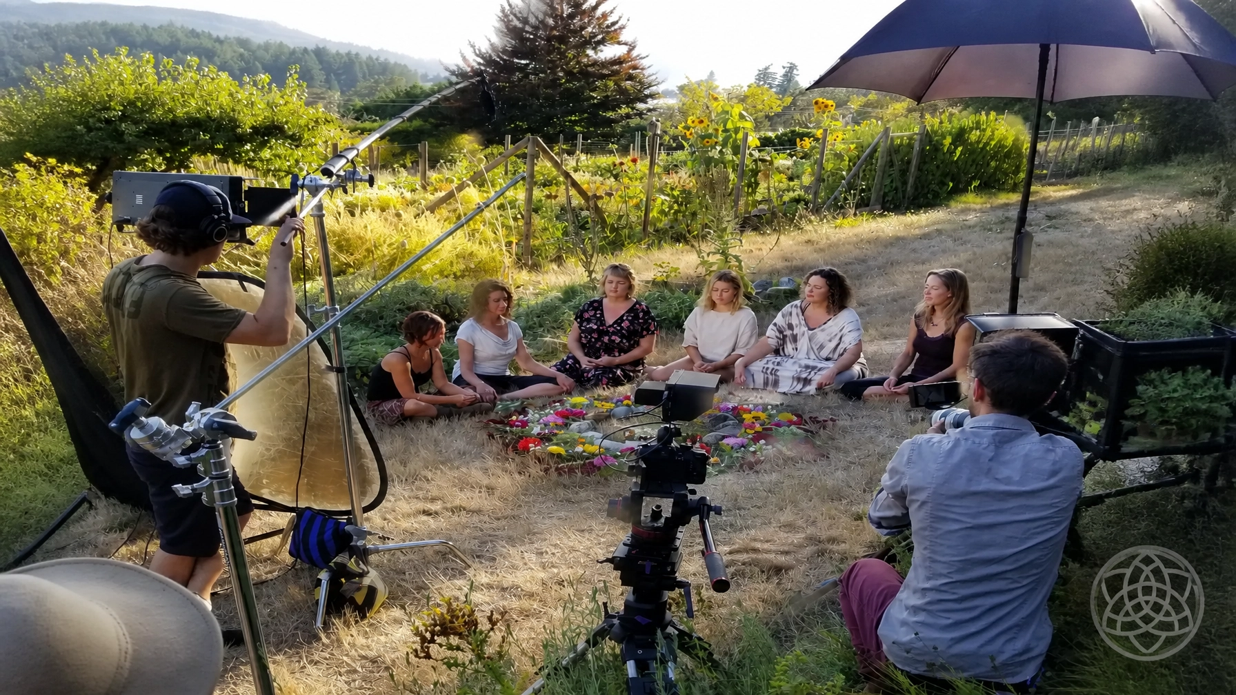 Natural health students sat in a circle in a ceremony studying the use of traditional herbal medicine with Seraphina Capranos, herbalist.